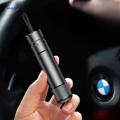 SafeKey Pro window breaker held in hand showing ready-to-use position for car emergencies.
