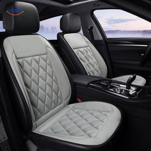 Heated car seat cushion providing instant warmth during cold winter driving conditions.