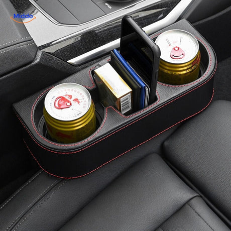 SpaceMate organizer installed in car seat holding drinks and phone.