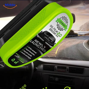 Applying ClearView glass cleaner sponge to car windows for crystal-clear visibility.