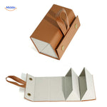 Caramel foldable 2-slot eyeglasses case shown closed, displaying its warm-tone exterior.