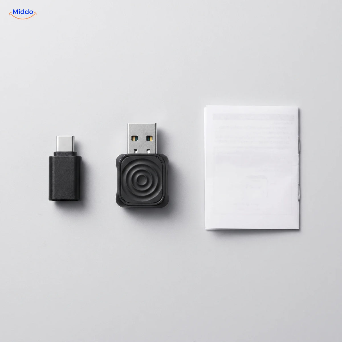 What is in the box: adapter, USB-C adapter and manual