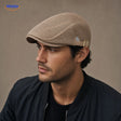 Casual Flat Cap™ | Effortless Style, Every Day in Khaki, worn by a model