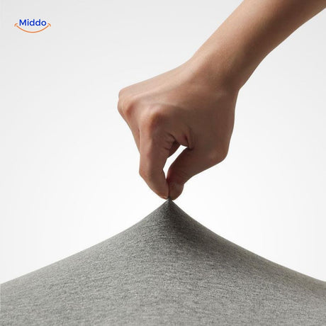 Supportive memory foam cushion designed for enhanced comfort during extended chair use.