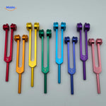 Chakra healing fork set: root, sacral, heart, and crown frequency forks.