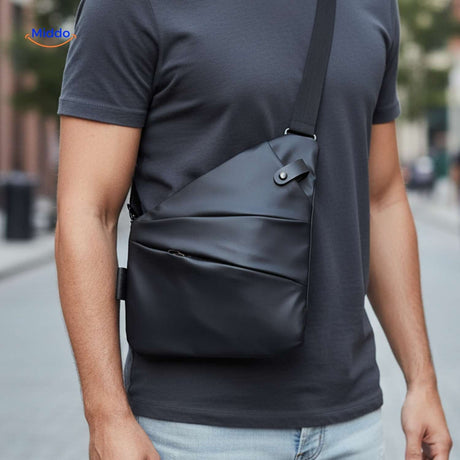 Black lightweight chest bag styled with casual everyday outfit.