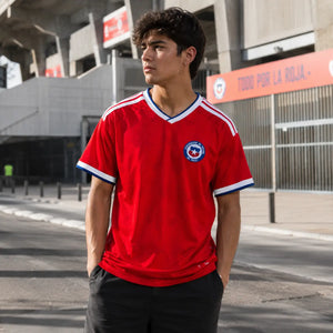 Chile World Cup jersey featuring vibrant red in official design.