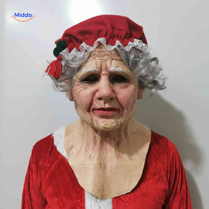 Holiday-themed old woman mask with Christmas hat and festive style.