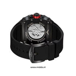 Premium men's chronograph watch in lifestyle setting and use.