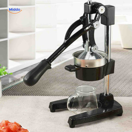 Professional-style Citripress manual citrus press demonstrated in use.
