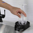 CleanTap glass rinser cleaning a wine glass