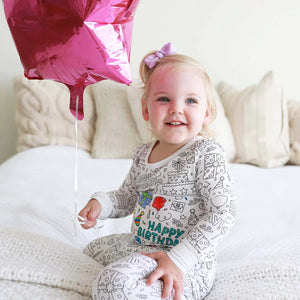 Birthday-themed coloring pajama for kids featuring fun balloon designs.