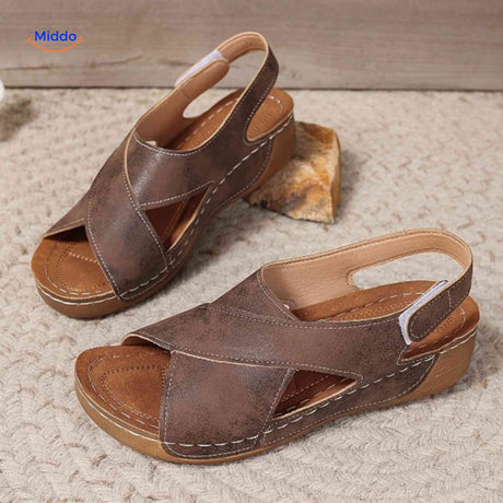 Stylish orthopedic sandals with breathable design for comfortable daily wear.