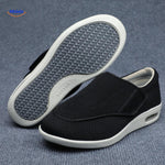 Black comfort shoes with easy velcro strap closure for all-day support.