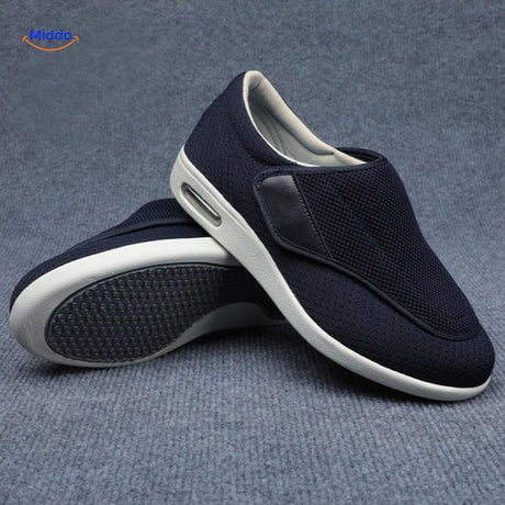 Navy blue therapeutic shoes with secure velcro strap support.