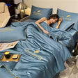DreamCity cooling blanket in classic blue, perfect for hot sleepers year-round.