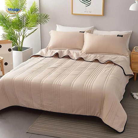 Lightweight cooling blanket in jade green creating soothing bedroom aesthetic.