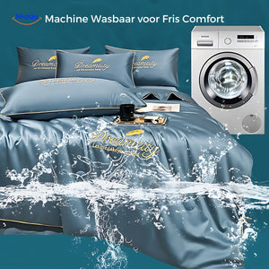 Cooling blanket in washing machine, highlighting easy care and washable design.