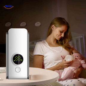Cordless bottle warmer used by a mother feeding her baby during a nighttime session