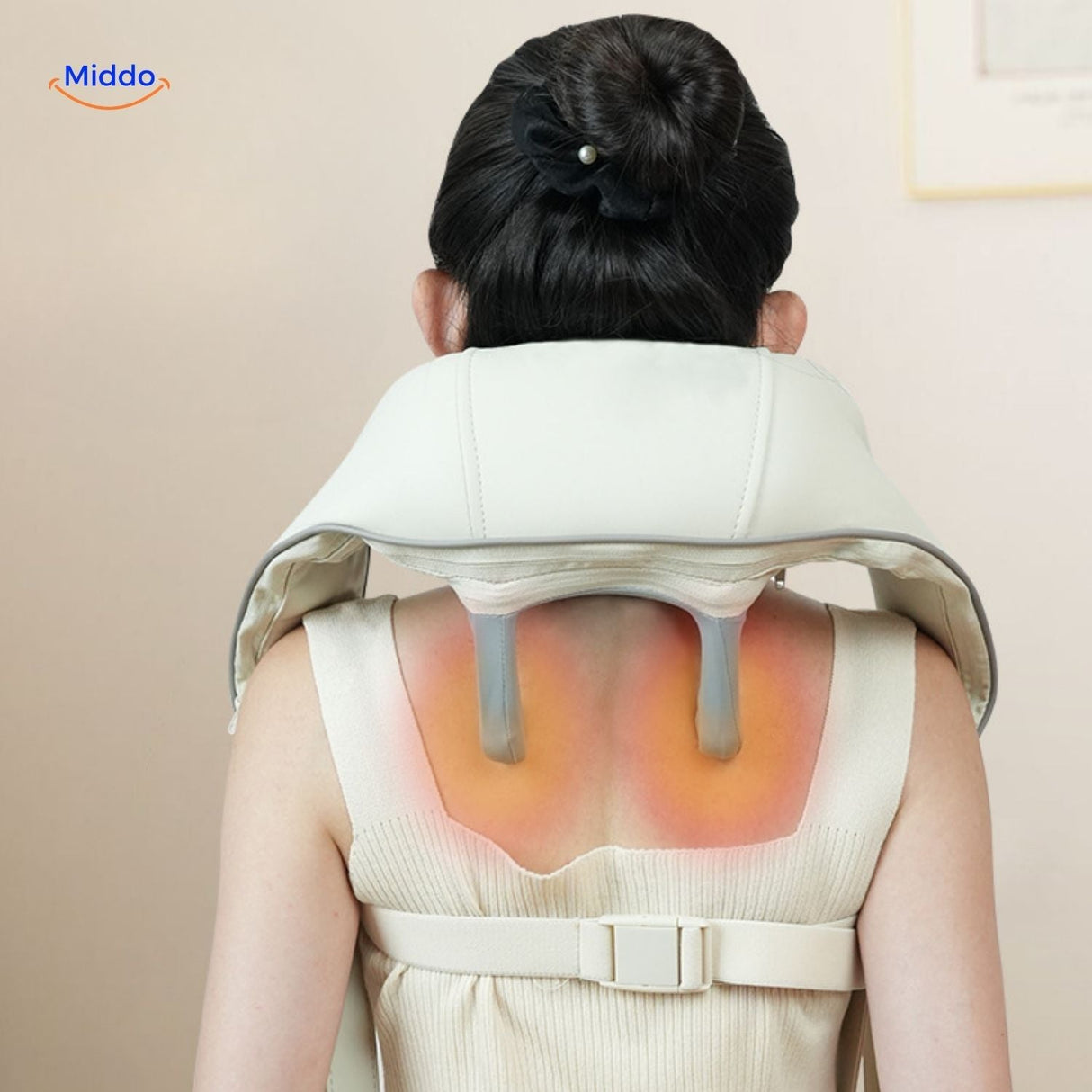 RelaxPro neck massager in cream with built-in heating function.