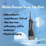 Cordless water flosser in compact 320ml travel size with expandable design.