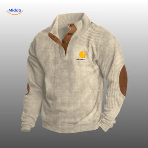 Light gray corduroy sweater featuring warm brown accent details.