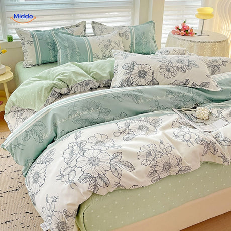 Breathable cotton bedding featuring green and white floral print pattern.