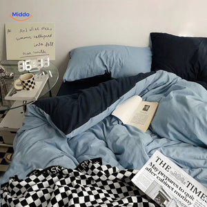 Cream minimalist dorm bedding set with modern aesthetic on bed