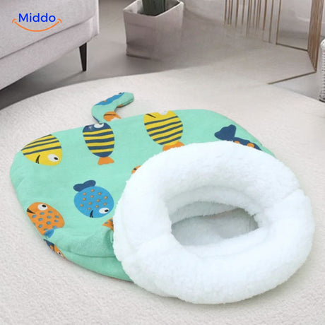 Cozy cat bed with cat resting inside showing enclosed shelter design.