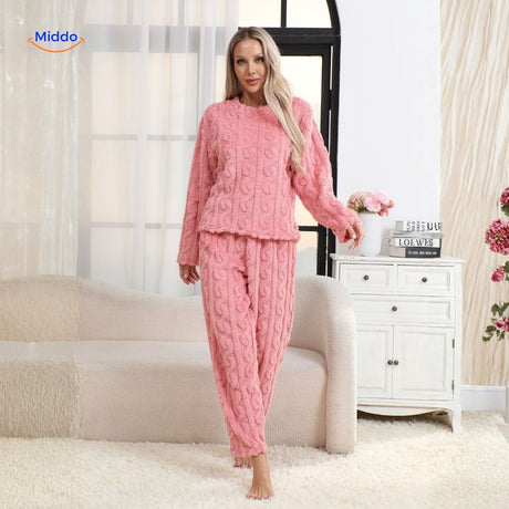 Purple soft fleece pajama set with comfortable warmth and relaxed fit.