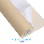 Cream leather repair patch designed to match light upholstered furniture.