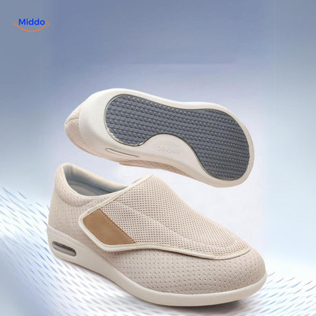 Cream colored shoes with warm tan accent details.