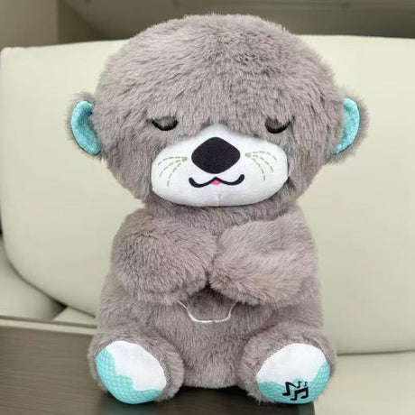 CuddleBuddy sleep soother plush displayed from side angle showing full shape.