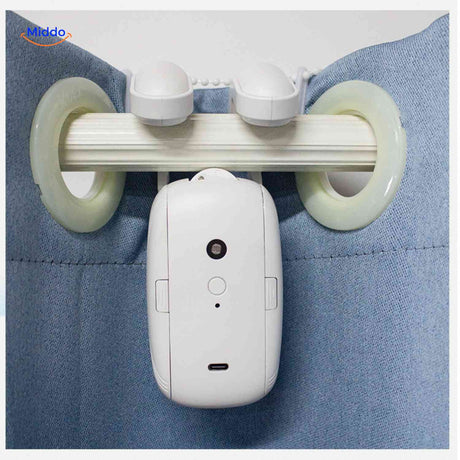 Smart motor mounted on Roman curtain rod with ring application.