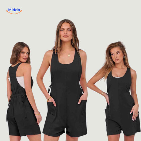 Dark gray jumpsuit featuring decorative tie details and side pockets.
