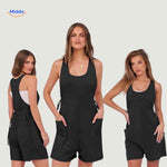 Dark gray jumpsuit featuring decorative tie details and side pockets.