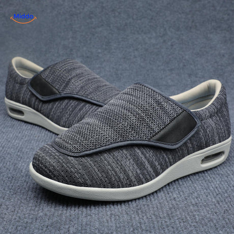 Dark gray therapeutic shoes with adjustable velcro closure.