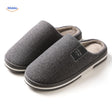 Close-up texture view of dark gray non-slip slippers.