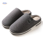 Close-up texture view of dark gray non-slip slippers.