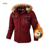 Dark red insulated men's parka with fur collar and chest print.