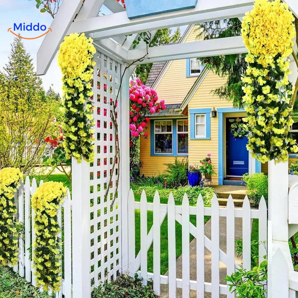 Decorative orchid flowers arranged in a beautiful home setting.