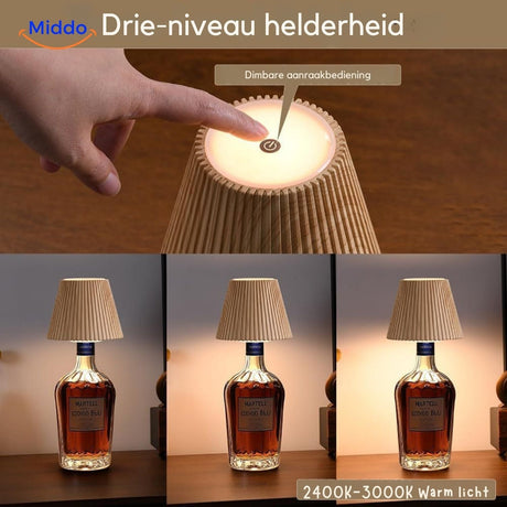 Rechargeable wine bottle lamp with dimmable LED light and elegant design.