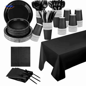 Black disposable party tableware set with elegant plates, cups, cutlery, and servies.