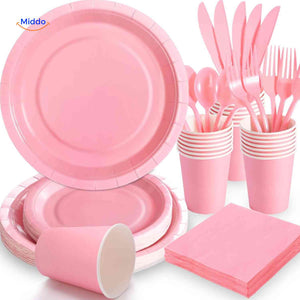 Pink disposable party tableware set for celebrations with matching plates, cups, cutlery.