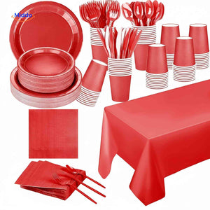 Red disposable party tableware set with plates, cups, cutlery for festive celebrations.
