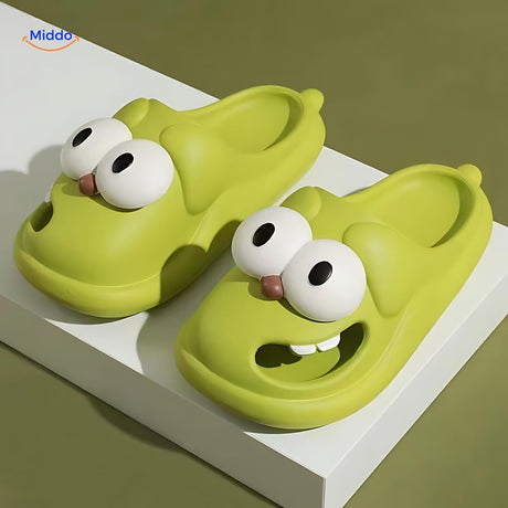 Green dog slippers featuring adorable cartoon dog face design.