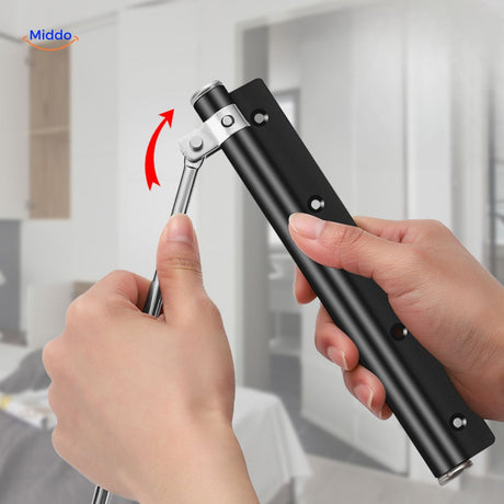 Black door closer in action demonstrating smooth closing operation.