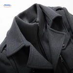 Close-up of the double collar detail on the grey wool coat, showing layered lapel construction.