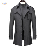 Double-collar wool coat in grey, styled as a classic trench coat with clean lines.