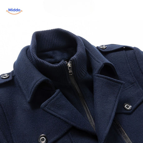 Close-up of the double collar on the dark navy wool coat showing the layered collar construction.